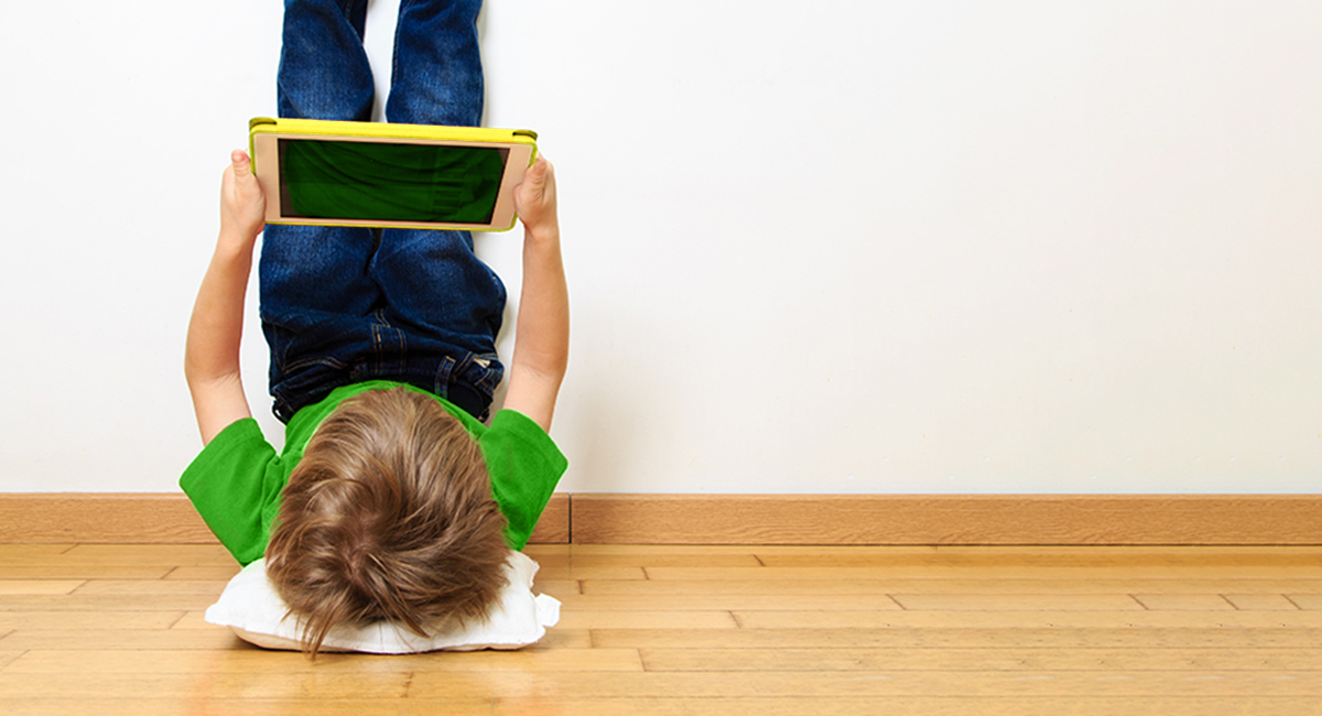 child playing on an Ipad