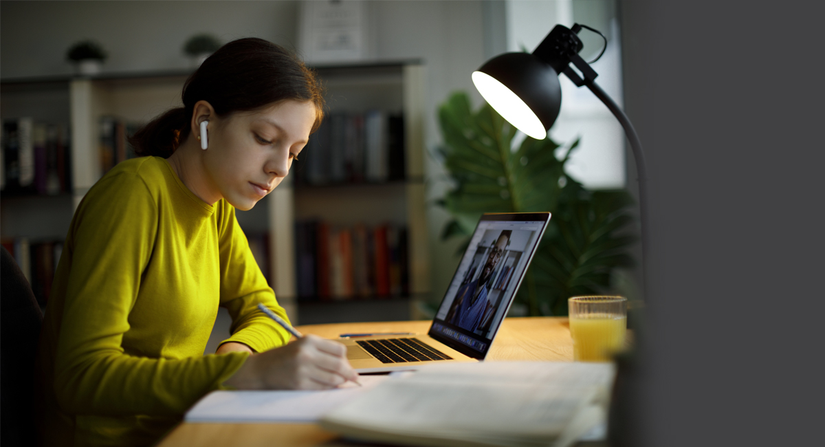 woman studying in from of laptop